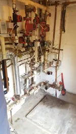 A room filled with lots of pipes and valves.